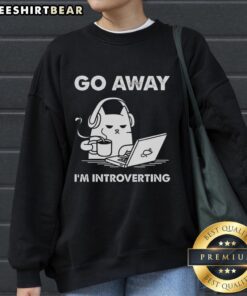 Funny cat graphic on a 'Go Away, I'm Introverting' sweatshirt, perfect for cat lovers and introverts alike.
