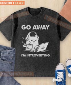 Funny cat on a washed t-shirt with 'Go Away, I'm Introverting' text, perfect for cat lovers and introverts.