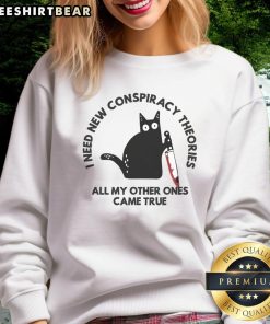 Funny cat sweatshirt featuring the phrase I Need New Conspiracy Theories, All My Other Ones Came True. Perfect for cat lovers!