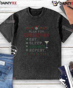 Alt Text: Funny Christmas Eat Sleep Martini Repeat holiday washed t-shirt design featuring festive graphics and a playful slogan.