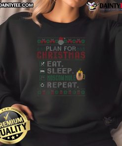 Funny Christmas sweatshirt featuring 'Eat Sleep Moscow Mule Repeat' design, perfect for holiday celebrations.