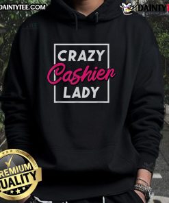 Funny crazy cashier lady in a grocery store wearing a hoodie, showcasing her vibrant personality and retail worker spirit.
