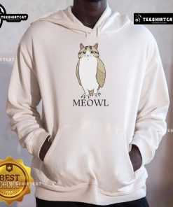 Adorable funny cute cat in an owl hoodie, showcasing a playful expression and cozy fashion for pet lovers.
