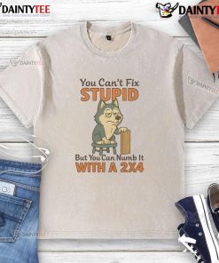 Funny husky wearing a 'You Can't Fix Stupid' t-shirt, showcasing a humorous take on pet apparel and dog humor.
