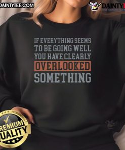 Funny sweatshirt with 'If everything is going well, you have overlooked something' quote, perfect for casual wear.