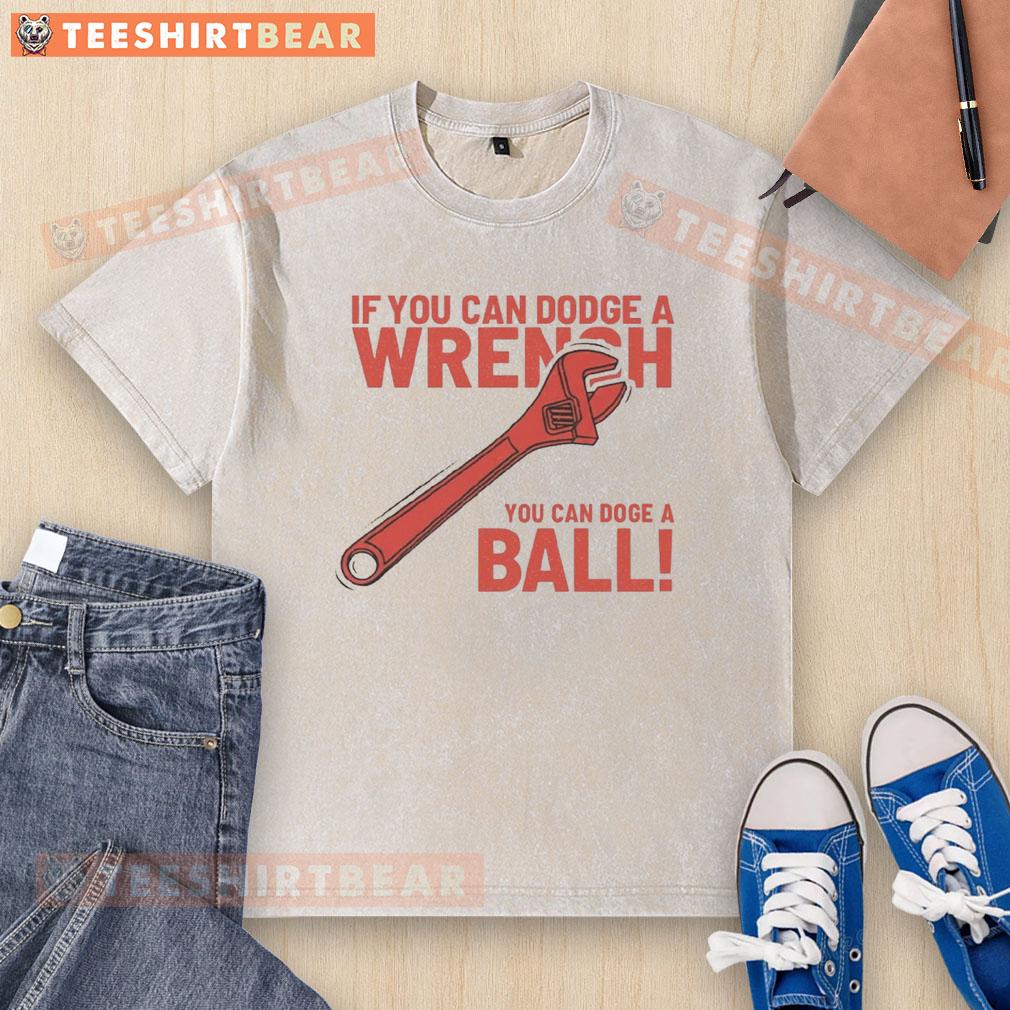 Funny If You Can Dodge A Wrench You Can Dodge A Ball Washed T Shirt Funny 'If You Can Dodge A Wrench, You Can Dodge A Ball' washed t-shirt design showcasing humor and playful sports theme.