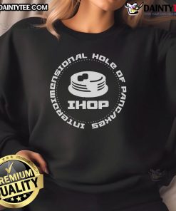 Funny interdimensional hole of pancakes sweatshirt featuring a whimsical design of floating pancakes in a vibrant scene.