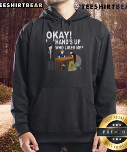 Alt Text: Funny Okay Hands Up Who Likes Me Hoodie featuring a playful design perfect for casual wear and humor lovers.