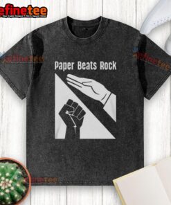 Funny Paper Beats Rock logo on a washed t-shirt, showcasing a playful design for casual wear enthusiasts.
