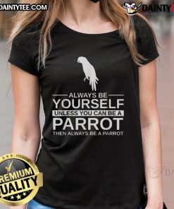 Funny parrot lover tee featuring 'Always be yourself unless you can be a parrot' slogan, perfect for bird enthusiasts.