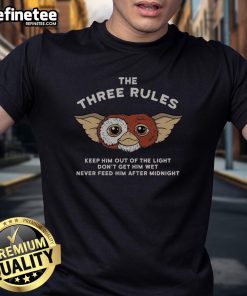 Funny retro Gizmo T-shirt featuring the three rules from Gremlins, perfect for fans of classic movies and quirky fashion.