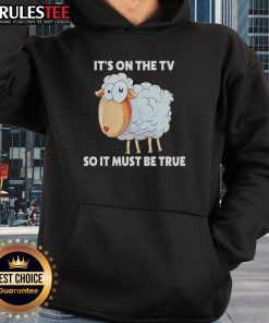 Funny sheep hoodie featuring 'It's on the TV, so it must be true' graphic, perfect for casual wear and humor lovers.