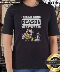 Funny Snoopy and Charlie Brown tee featuring 'I see no good reason to act my age' for a playful, youthful vibe.