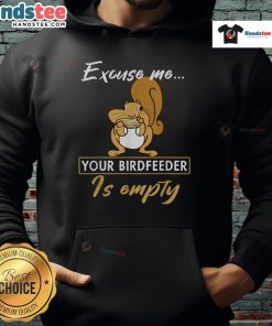 Funny squirrel in a cute animal hoodie looks at an empty birdfeeder, highlighting its adorable expression.