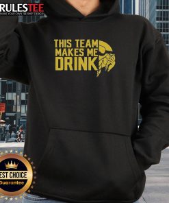 Alt Text: Funny Minnesota Vikings hoodie with 'This Team Makes Me Drink' slogan, perfect for fans showing team spirit.