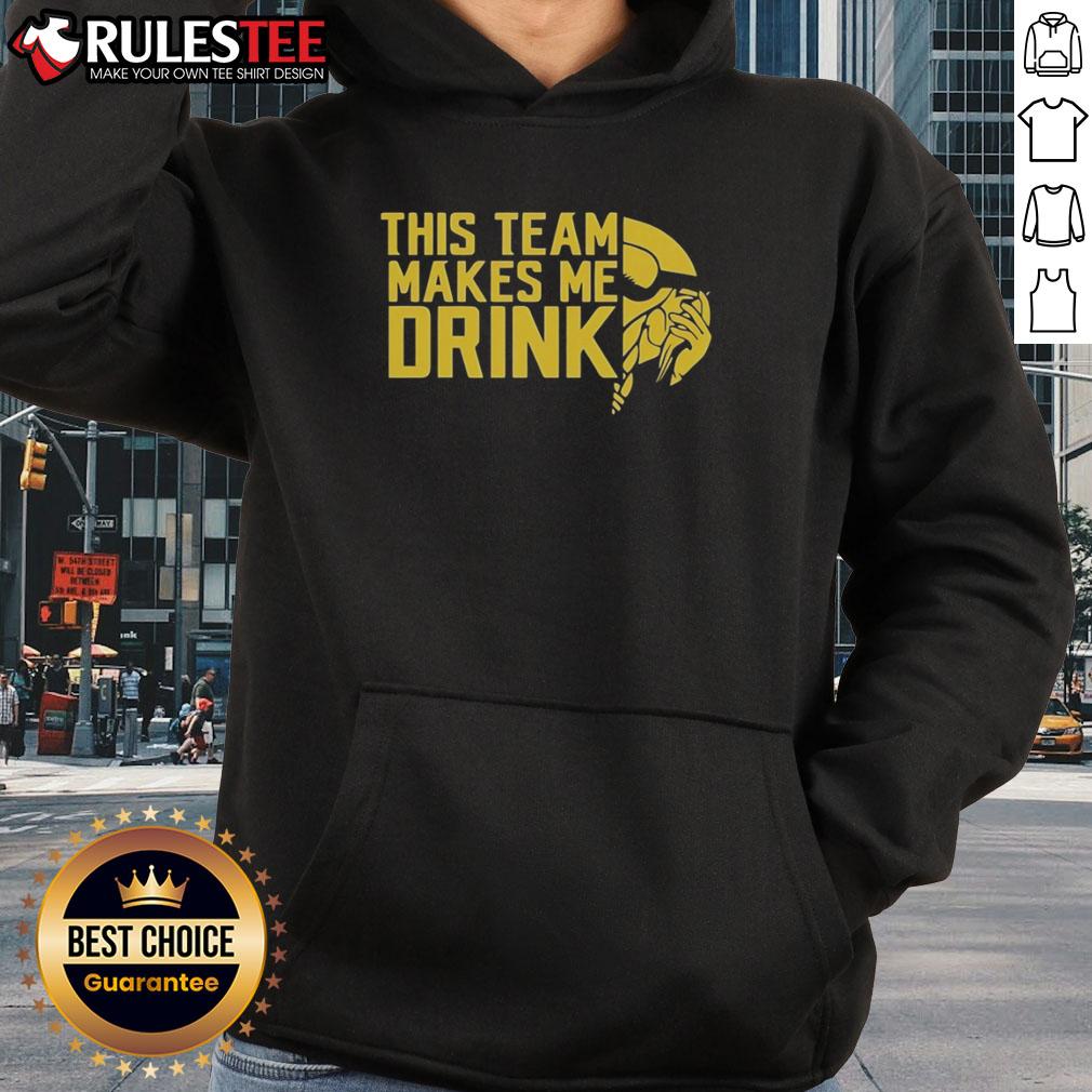 Funny This Team Makes Me Drink Minnesota Vikings Logo Hoodie Alt Text: Funny Minnesota Vikings hoodie with 'This Team Makes Me Drink' slogan, perfect for fans showing team spirit.