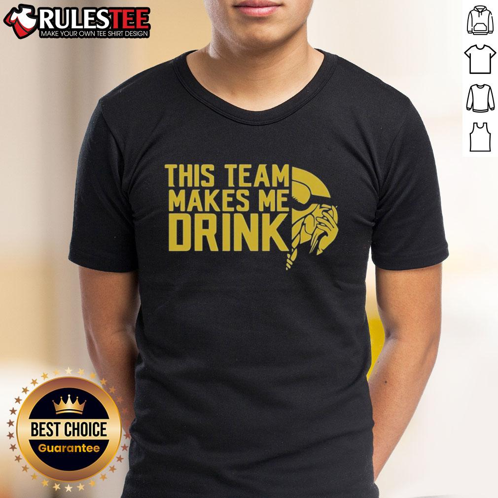 Funny This Team Makes Me Drink Minnesota Vikings Logo T Shirt Funny Minnesota Vikings logo T-shirt that says 'This Team Makes Me Drink' perfect for fans and game day attire.