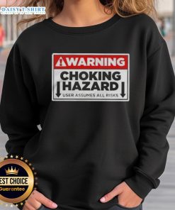 Funny warning choking hazard sweatshirt with playful text, reminding users they assume all risks in a humorous way.