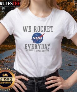 Funny We Rocket NASA Everyday tee for ladies at Kennedy Space Center, featuring a playful design for space enthusiasts.