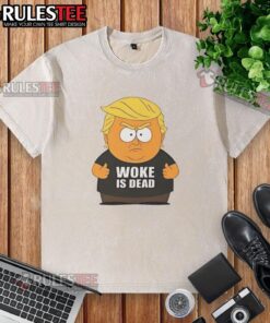 Alt Text: Funny woke is dead Trump cartoon from South Park, showcasing a humorous political parody on a washed t-shirt design.