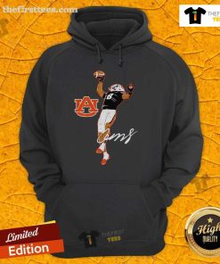 Cam Coleman in a signature hoodie showcasing his superstar pose for the Auburn Tigers football team.