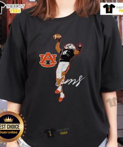 Cam Coleman in a superstar pose wearing a ladies tee, showcasing Auburn Tigers football spirit and style.