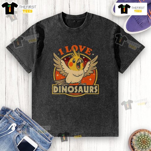 Alt Text: Good Bird Love Dinosaurs washed t-shirt featuring colorful dinosaur graphics on a soft fabric background.