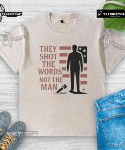Alt Text: Good Charlie Kirk 'They Shot The Words, Not The Man' washed t-shirt featuring bold text and a casual design.