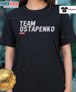 Good Christians Court Team with Ostapenko in Ladies Tee, showcasing unity and sportsmanship in a vibrant outdoor setting.