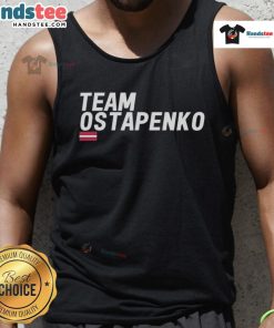 Good Christians Court Team in Ostapenko tank top, showcasing team spirit and style on the basketball court.