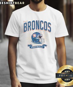 Distressed vintage t-shirt featuring a Denver Broncos football helmet design, perfect for fans and collectors.