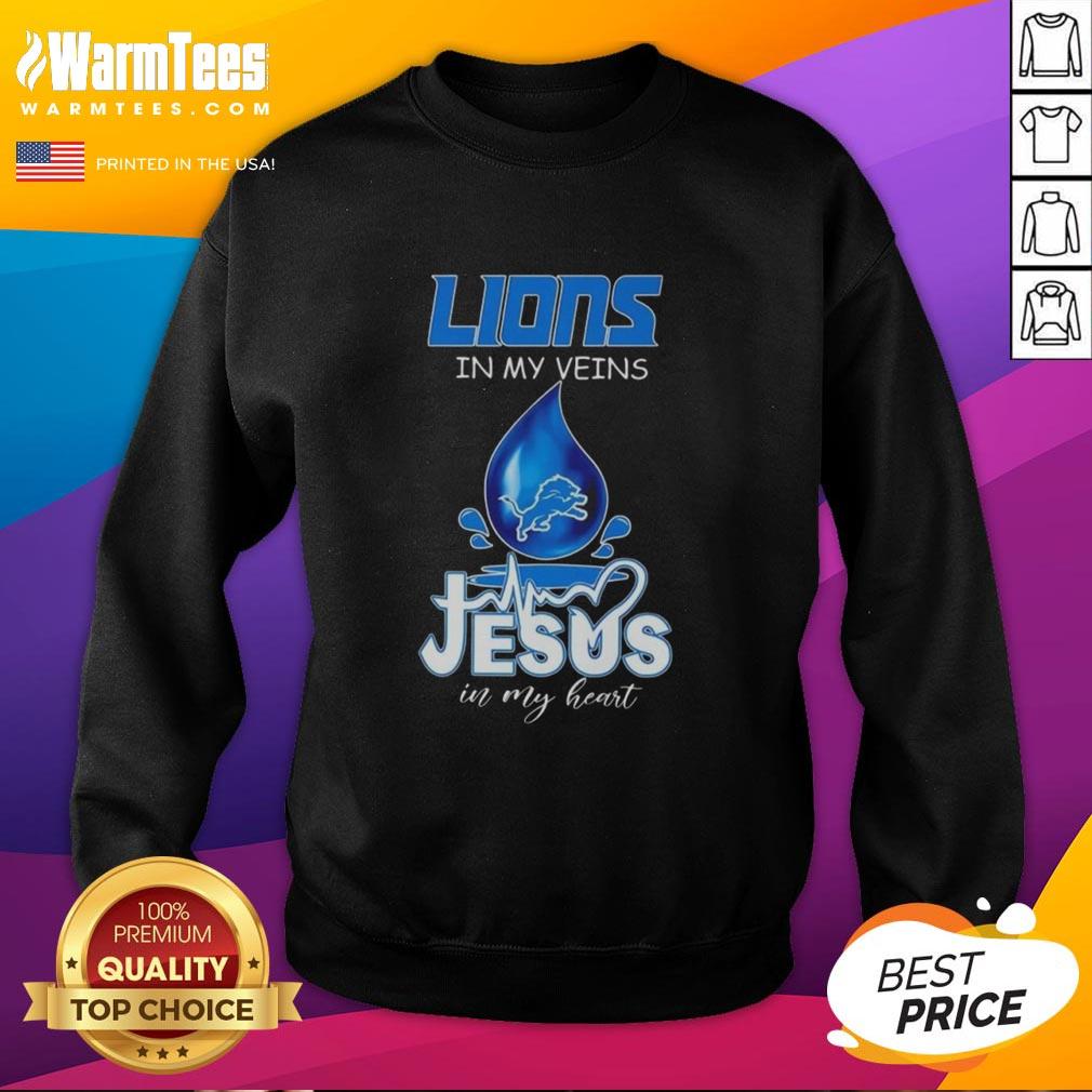 Good Detroit Lions In My Veins Jesus In My Heart Drops Of Water Football Lovers Sweatshirt Alt Text: Good Detroit Lions in my veins, Jesus in my heart sweatshirt for football lovers, featuring drops of water design.