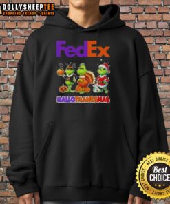 Happy HalloThanksMas hoodie featuring a unique FedEx x Grinch cosplay design, perfect for festive holiday celebrations.