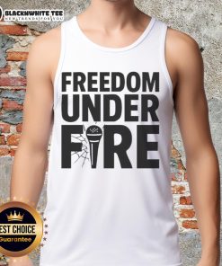 Charlie Kirk wearing a Good Freedom Under Fire tank top, promoting freedom and individual rights at an event.