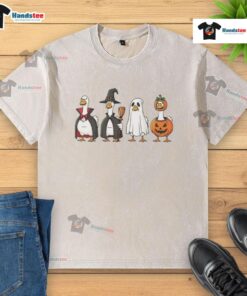 Good geese dressed up in Halloween costumes on a washed t-shirt, perfect for festive apparel and seasonal fun.