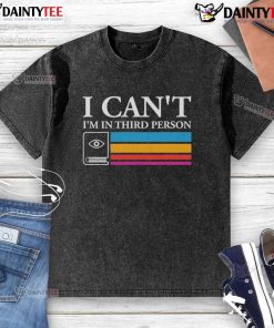 Good I Can't I'm In Third Person washed t-shirt displayed on a hanger, showcasing a stylish graphic design.