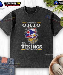 Good I May Live In Ohio But I'm A Minnesota Vikings Fan Forever washed t-shirt design showcasing team spirit.