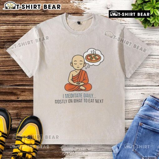 Person meditating daily in a washed t-shirt, focusing on healthy eating choices and mindfulness practices.
