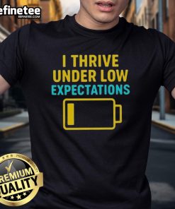 Alt Text: Good I Thrive Under Low Expectations T-Shirt featuring a humorous design for casual wear fans.