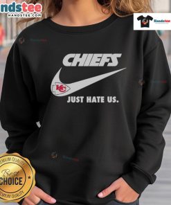 Alt Text: Good Just Hate Us Nike Kansas City Chiefs logo sweatshirt featuring team colors and iconic emblem design.