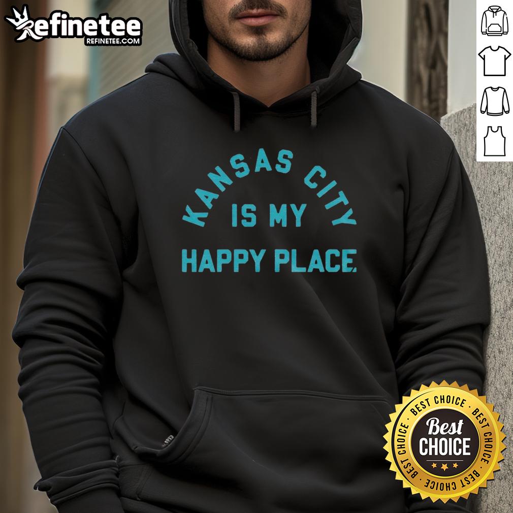Good Kansas City Is My Happy Place Hoodie Cozy Good Kansas City Is My Happy Place Hoodie displayed on a wooden background, perfect for city pride and comfort.