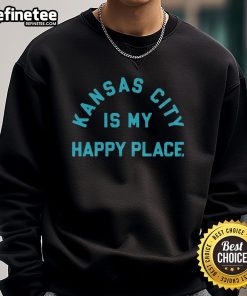 Cozy Good Kansas City Is My Happy Place sweatshirt displayed on a rustic wooden background.