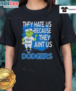 Womens Los Angeles Dodgers Grinch Christmas tee featuring 'They Hate Ain't Us' design for festive sports fans.