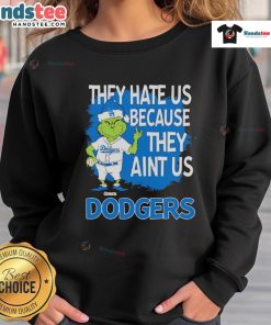Los Angeles Dodgers Grinch Christmas sweatshirt featuring 'They Hate Ain't Us' design, perfect for holiday sports fans.