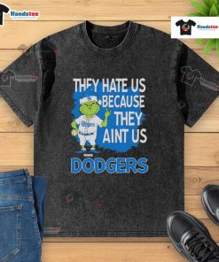 Los Angeles Dodgers Grinch Christmas t-shirt with 'They Hate Ain't Us' design, perfect for festive baseball fans.