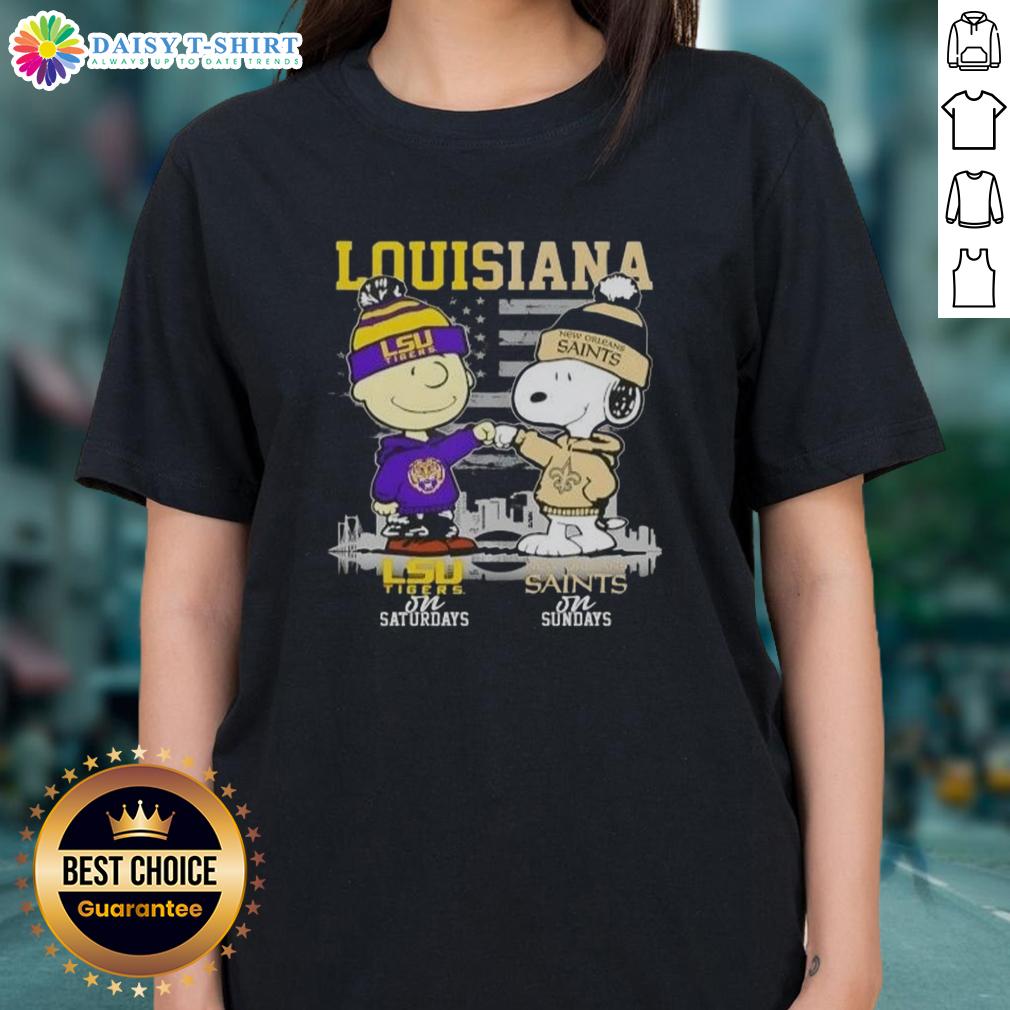 Good Louisiana Sports Charlie Brown LSU Tigers On Saturdays X Snoopy New Orleans Saints On Sundays Skyline Ladies-Tee Good Louisiana sports tee featuring Charlie Brown, LSU Tigers on Saturdays, and New Orleans Saints skyline design.