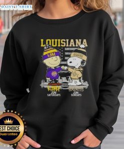 Alt Text: Good Louisiana Sports sweatshirt featuring Charlie Brown, LSU Tigers on Saturdays, and Snoopy with New Orleans Saints skyline.