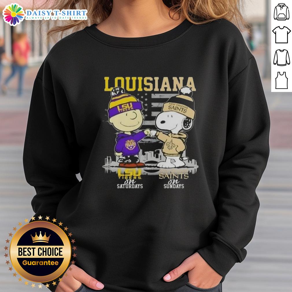 Good Louisiana Sports Charlie Brown LSU Tigers On Saturdays X Snoopy New Orleans Saints On Sundays Skyline Sweatshirt Alt Text: Good Louisiana Sports sweatshirt featuring Charlie Brown, LSU Tigers on Saturdays, and Snoopy with New Orleans Saints skyline.