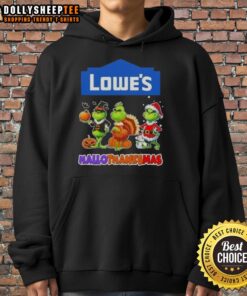 Cheerful cosplayer wearing a Good-Lowes-X-Grinch hoodie for Happy HalloThanksMas celebration, showcasing festive spirit.