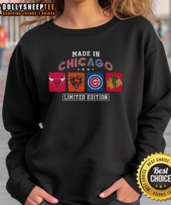 Cozy Made in Chicago sports sweatshirt featuring logos of Bulls, Bears, Cubs, and Blackhawks in stylish design.